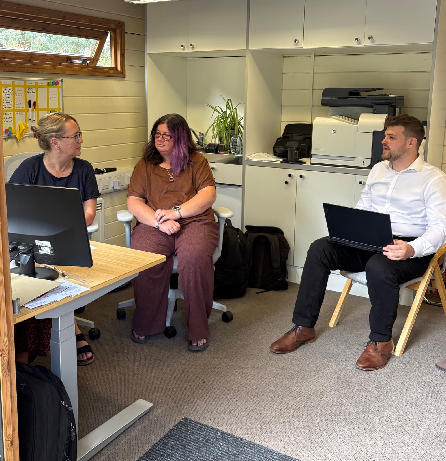 Sam Hirsch of AI Edge with two members of the Leigh Park Accountancy team during the training session in their office